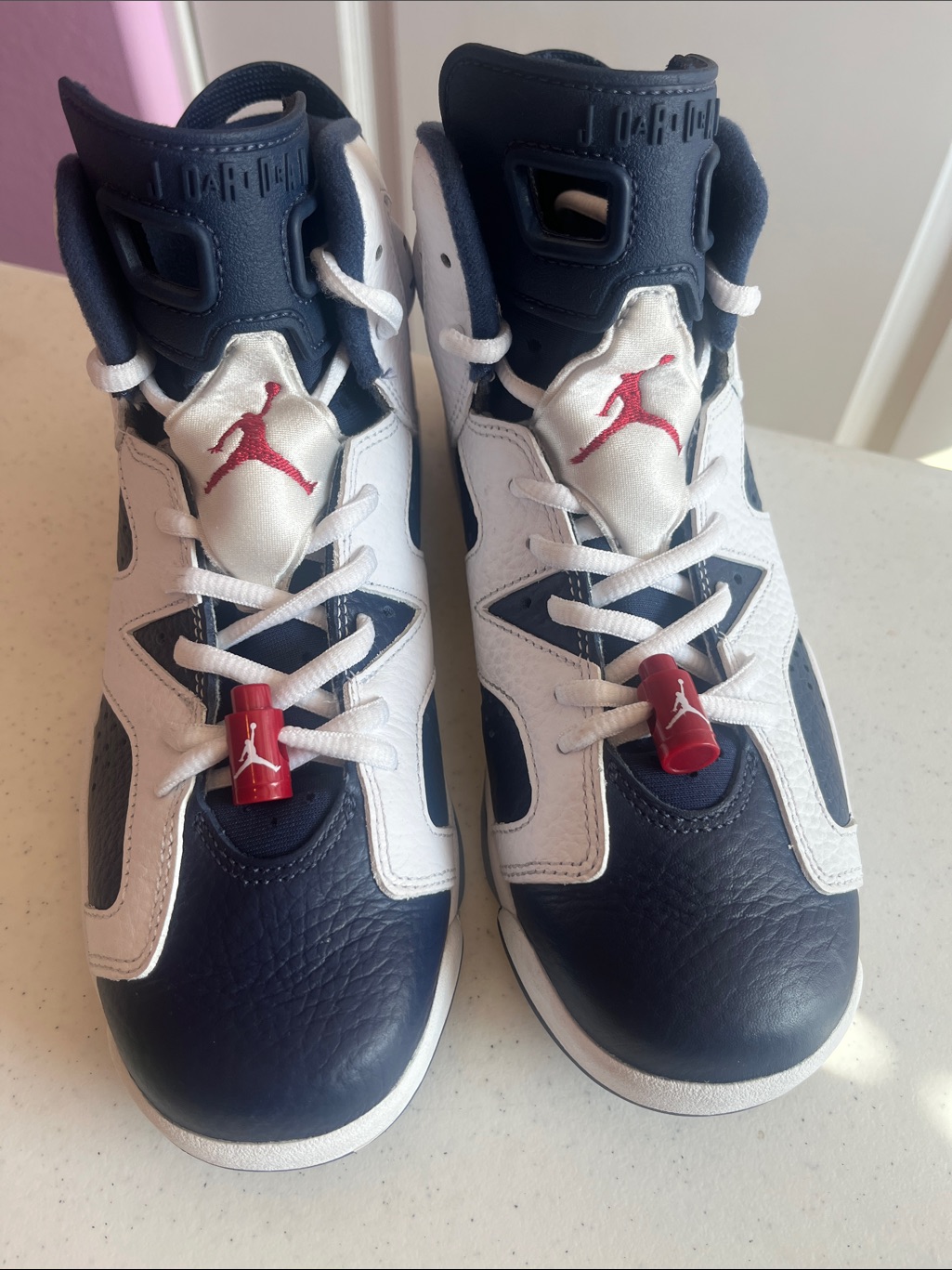The Nike Air Jordan 6 Retro "Olympic" Size 7 Y